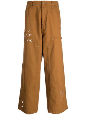 izzue paint-splatter straight trousers - Brown