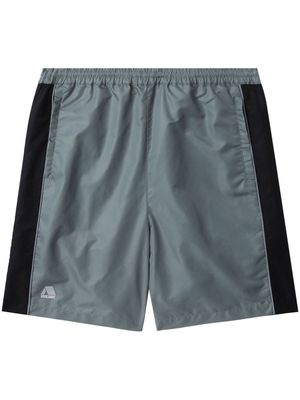 izzue side-stripe elasticated track shorts - Green