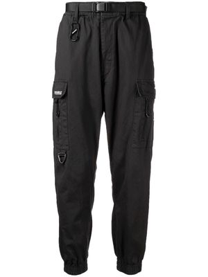 izzue tapered-leg utility trousers - Black