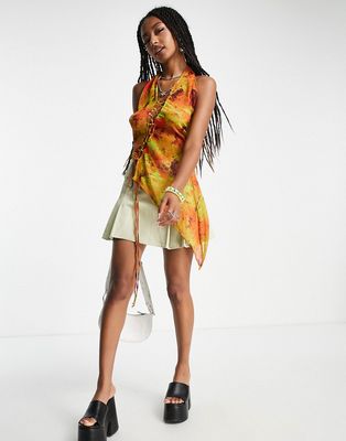 Jaded London halterneck asymmetric top with lace-up front in multi spring print