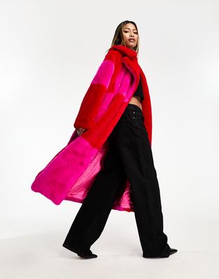 Jayley faux fur checkerboard long coat in pink and red