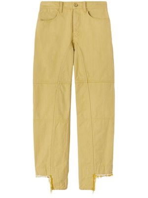 Jil Sander asymmetric-hem fringed jeans - Yellow
