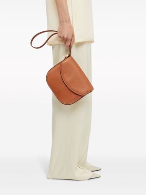 Jil Sander logo-debossed leather crossbody bag - Brown