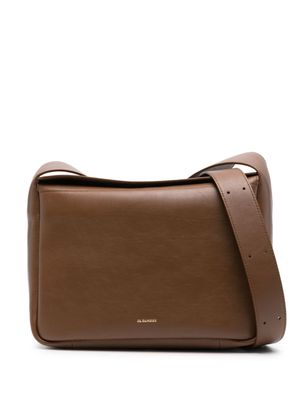 Jil Sander logo-stamp leather crossbody bag - Brown