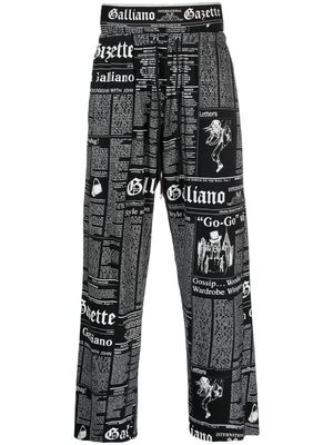 John Galliano Pre-Owned 2010 Gazette print wide-legged trousers - Black
