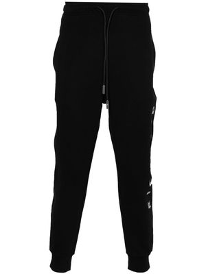 John Richmond logo-embroidered tapered trousers - Black