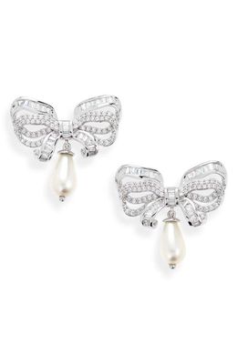 Judith Leiber Imitation Pearl Drop Pavé Bow Earrings in Gold/Clear