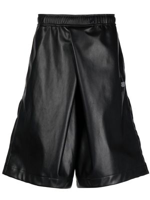 Julius faux leather knee-length track shorts - Black