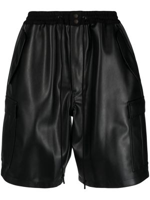 Junya Watanabe MAN cargo-pockets faux-leather shorts - Black