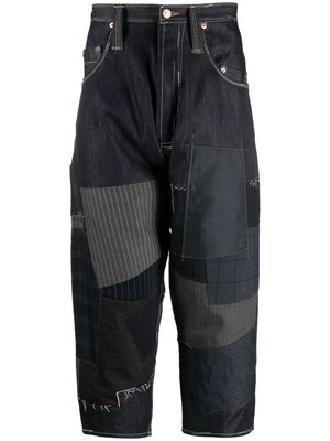 Junya Watanabe MAN patchwork-design cropped trousers - Blue