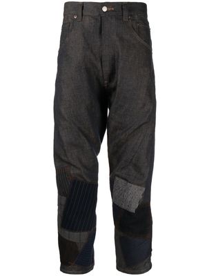 Junya Watanabe MAN patchwork-detail cropped trousers - Blue