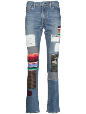 Junya Watanabe MAN patchwork fitted jeans - Blue