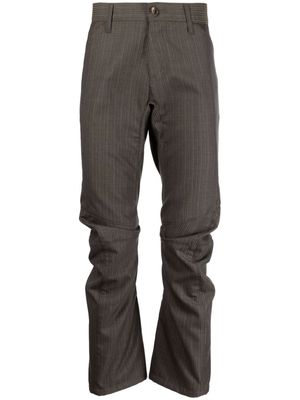 Junya Watanabe MAN stripe-print wool trousers - Brown