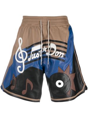 Just Don graphic-print lambskin shorts - Brown