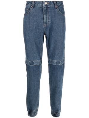 Juun.J knee-detail elasticated-ankle jeans - Blue