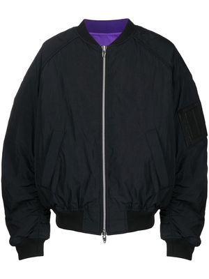 Juun.J logo-appliqué reversible bomber jacket - Purple