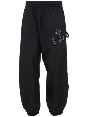 JW Anderson Anchor-embroidered twisted track pants - Black