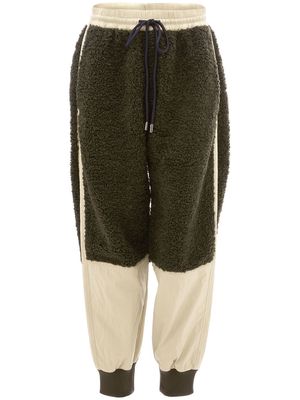 JW Anderson shearling-trim tapered joggers - Green