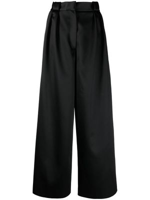 KHAITE pleat-detail palazzo trousers - Black