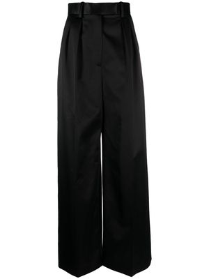 KHAITE Teyana high-waisted satin trousers - Black