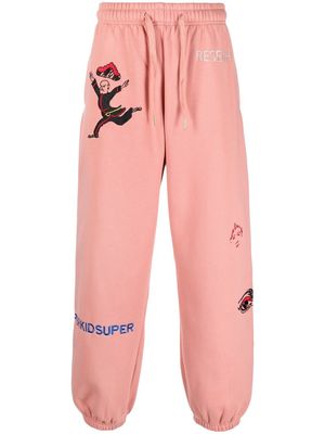 KidSuper embroidered two-pocket track pants - Pink