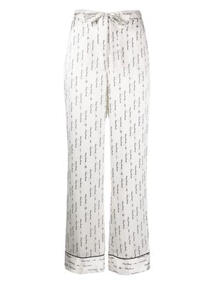 Kiki de Montparnasse Fucking Beautiful logo-print pajama bottoms - White