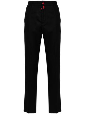 Kiton logo-patch button-fastening tapered trousers - Black