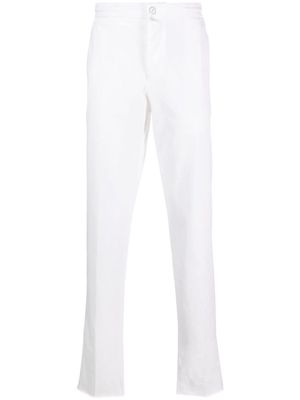 Kiton logo-patch chino trousers - White