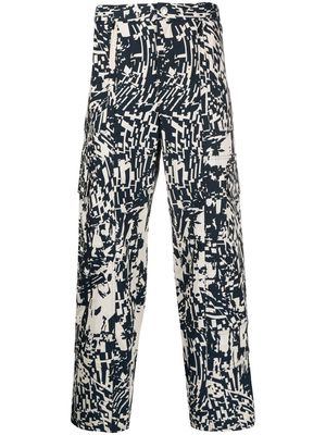 Koché abstract-pattern straight trousers - Neutrals