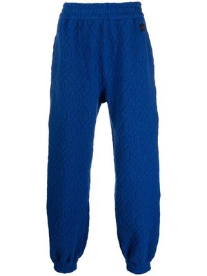 Koché patterned-jacquard track pants - Blue