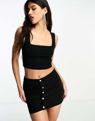 Kyo The Brand mini skirt with diamante button detail in black - part of a set