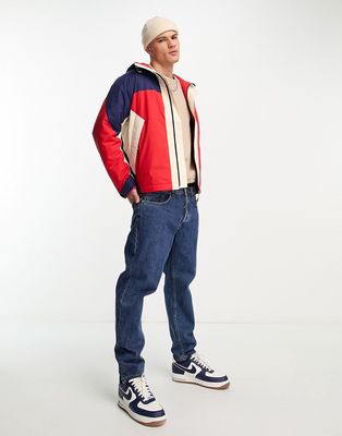 Lacoste black color panel jacket in red and navy