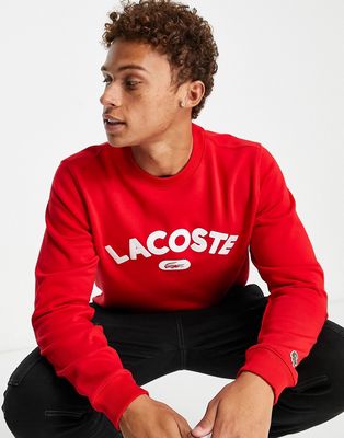 Lacoste chest logo sweatshirt in red