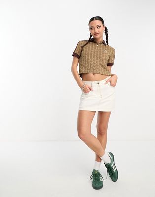 Lacoste cropped polo shirt in brown with all over print