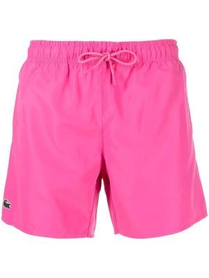 Lacoste embroidered logo swimming shorts - Pink