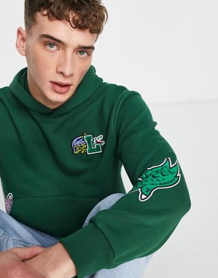 Lacoste Holiday badge hoodie in green