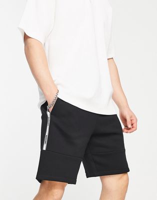 Lacoste jersey tape detail shorts in black