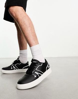 Lacoste L001 sneakers in White and Black