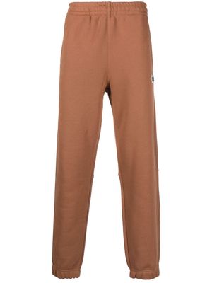 Lacoste logo-patch organic-cotton track trousers - Brown