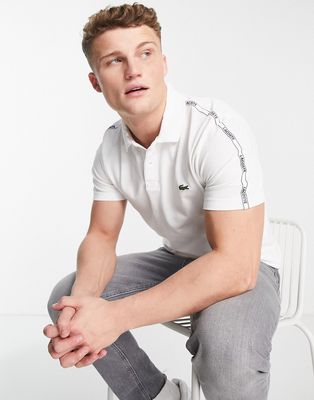 Lacoste taped sleeve polo in white