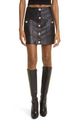 L'AGENCE Truman Snap Faux Leather Miniskirt in Black