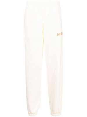 Late Checkout logo-embroidered tapered sweatpants - White