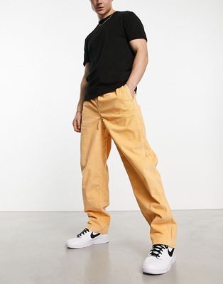 Levi's Skate quick release pants in yellow with belt