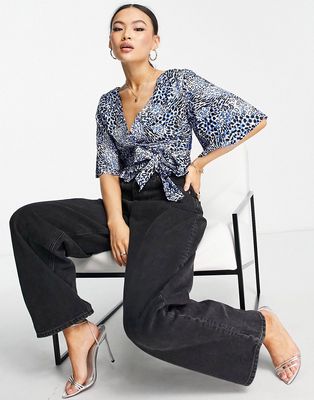 Liquorish cropped animal print top with waist tie in blue