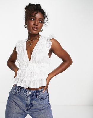 Lispy shirred waist v neck top in white