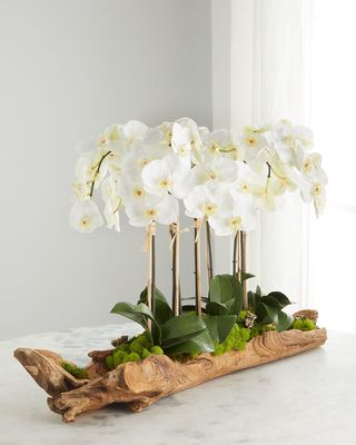 Log Filled with Faux White Orchids