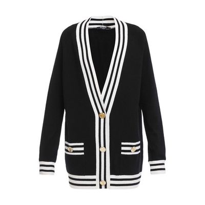 Long-sleeved gilet Straight cut V-neck Two front pockets Snap-button closure Logo at the back Striped pattern Buttoned fastening