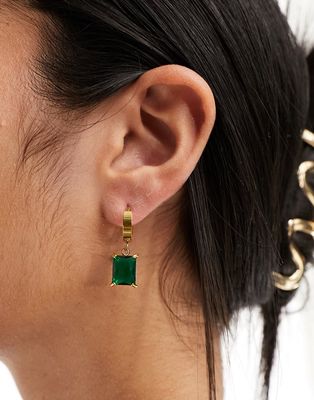 Lost Souls stainless steel huggie hoop earrings with emerald charm in gold