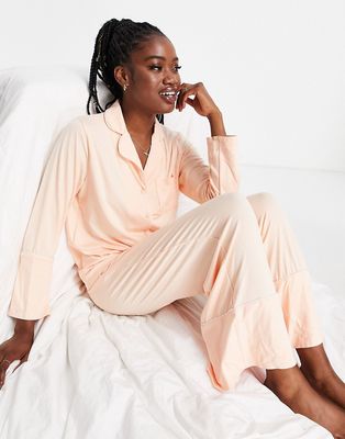 Loungeable super soft jersey camp collar top and wide leg pants pajama set with piping detail in peach-Orange