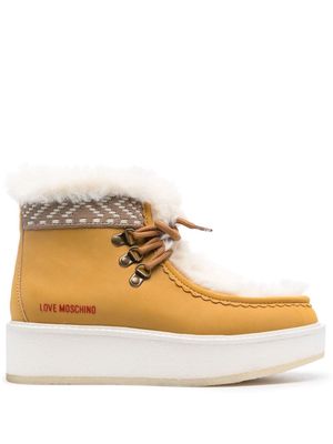 Love Moschino embossed-logo faux-fur ankle boots - Neutrals